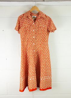 VINTAGE Women's 1960s Fit and Flare Day Dress | Orange Abstract | Unique! Description Australian designed, DOMONY of Sydney, this orange number is slinky and cool, great for Summer! It features buttons from crotch to chest, short sleeves and darts. It does appear that there has been a bit of work done to the seams with some hand sewn alterations/repairs. See pics. Some little holes here and there so it will need a bit of love. Priced accordingly! Material - not labelled Brand - Domony Sydney Siz Orange Number, Dress Orange, Australian Design, Day Dress, Dress Clothes For Women, Hand Sewn, Day Dresses, Fit And Flare, Shift Dress