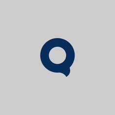 the letter q in blue on a gray background with an oval shaped object above it