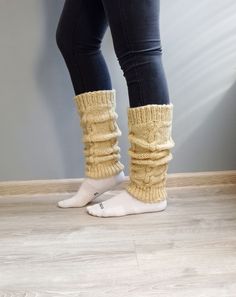 These beautiful traditional hand-knitted wool leg warmers are made to keep your feet warm and healthy during the cold winter days. They are thick and perfect for cold weather. You can wear them as home socks, for yoga, or put them on with your winter shoes as boot covers. Material: 100% natural sheep wool yarn! Natural sheep colors.  One size: Length - 40 cm Width - 12 cm measured on flat up to 16 cm stretching. If you need a different measurement, please be welcome to contact me. Discounts: Buy Cozy Knitted Socks For Fall, Cozy Hand Knitted Socks For Fall, Hand Knitted Knee-high Winter Socks, Hand Knitted Knee-high Socks For Winter, Cozy Warm Acrylic Socks, Cozy Wool Socks For Winter, Cozy Hand Knitted Leg Warmers, Cozy Hand Knitted Snug Leg Warmers, Hand Knitted Snug Cozy Leg Warmers