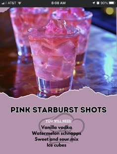 the pink starburst shots are served in glasses with ice cubes on top