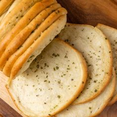 slices of garlic bread on a cutting board