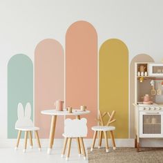 a child's play room with pastel colored walls