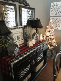 a decorated christmas tree in the corner of a room