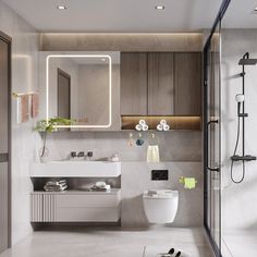 a bathroom with a toilet, sink and mirror in it's center wall is shown