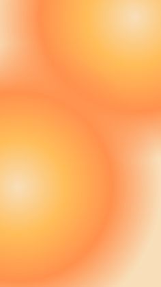 an orange background with two circles in the middle and one circle at the top that is slightly blurry