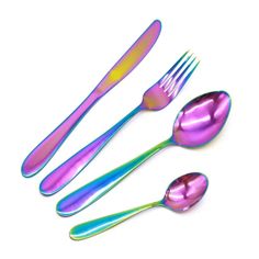 three forks, two spoons and one knife on a white surface