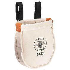 a white bag with two black handles and an orange handle on the bottom, hanging from it's side