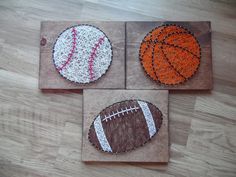 three handmade coasters with sports balls on them, one is orange and the other is brown