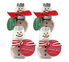 two snowmen made out of chocolate in a jar