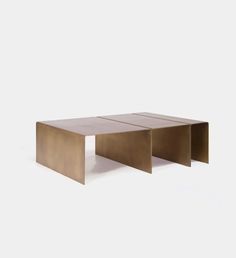 two rectangular tables sitting on top of each other