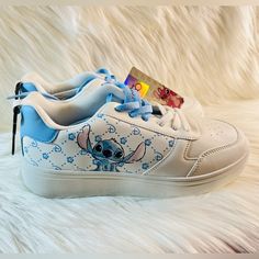 Disney’s 100th Year Anniversary X Primark Collaboration Stitch Low Top Shoes Great For A Stitch Fan! Primark Exclusive Stitch Sneakers, Disney Mickey Ears, Winnie The Pooh Plush, Disney Vacation Club, Stitch And Angel, Mouse Ears Headband, Low Top Shoes, Black Baseball Cap, Disney Ears