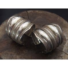 Antique Silver Afghan Cuff Pair Size approx. 6 1/2" to 7 1/2" Sold as a pair 80% or higher silver content Origin is Afghanistan Provenance: from the Collection of Lois Sherr Dubin. Lois Sherr Dubin wrote The History of Beads: From 30,000 B.C. to the Present (Abrams, 1987; reissued in paperback in 2004 and updated in 2009 as The History of Beads: From 100,000 to the Present), a beloved classic study and reference on the subject that has been published in five languages. Scholar, Researcher and Co Traditional Silver Round Cuff Bracelet, Traditional Sterling Silver Bangle With Polished Finish, Traditional Sterling Silver Cuff Bracelet For Weddings, Ceremonial Oxidized Finish Cuff Bracelet, Ceremonial Oxidized Finish Elegant Cuff Bracelet, Traditional Oxidized Bracelets For Formal Occasions, Traditional Handmade Sterling Silver Bracelet For Formal Occasions, Traditional Silver Bangle With Polished Finish, Elegant Ceremonial Cuff Bracelet With Oxidized Finish