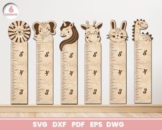 wooden growth chart with animals and giraffes on the sides, in front of a white wall