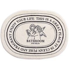 a bathroom rug with an angel on the front and back of it, saying enjoy your life this is a great experience