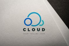 the logo for cloud is shown on top of a white paper with blue circles around it