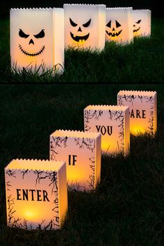 some paper bags that have faces on them and the words, if you are lanterns