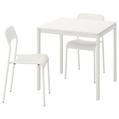 a white table and two chairs sitting next to each other on a white flooring