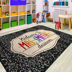 a child's playroom with toys, bookshelves and rugs on the floor