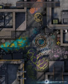 an aerial view of a building with graffiti on it