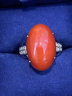 Pinterest Red Oval Cabochon Ring, Red Oval Cabochon Ring With Polished Finish, Luxury Red Oval Cabochon Ruby Ring, Luxury Orange Oval Cabochon Jewelry, Coral Oval Cabochon Jewelry, Cabochon Ring, Oval Rings, Diamond Cocktail Rings, Red Coral