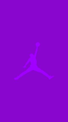 the silhouette of a person jumping up into the air