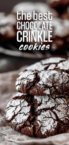 the best chocolate crinkle cookies are stacked on top of each other with powdered sugar