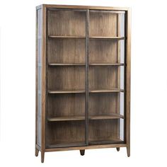 a wooden bookcase with glass doors on the front and bottom shelves, against a white background