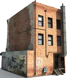 an old brick building with graffiti on it's side and stairs leading up to the second story