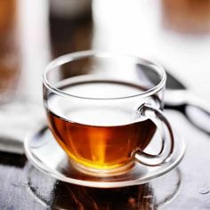 a cup of tea sitting on top of a saucer