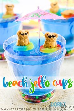 beach jello cups with teddy bears on top and candy in the bottom for kids to enjoy