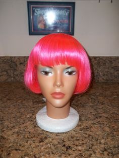 Pink wig,Halloween wig,Costume wig,Synthetic Hair ,Mannequin wig, By La Buosse Wonderful costume wig. Old stock, never used, still with retail tag attached. Ventilated cool cap so your scalp can breathe. Color is pink, short length style. Retail: $45.00 Maker: La Buosse Ships in one business day. BL223 Pink wig,Halloween wig,Costume wig,Synthetic Hair ,Mannequin wig, By La Buosse Funny Wigs, Hair Mannequin, Costume Wings, Wig Costume, Stylish Short Hair, Halloween Wigs, Pink Wig, Short Hair Wigs, Wings Costume