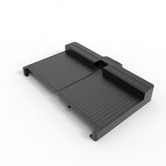 a black tray with two compartments on it