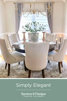 a dining room table with chairs and a chandelier