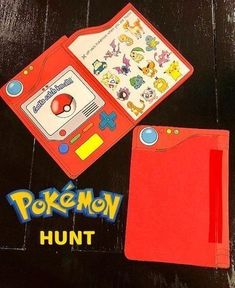 an old nintendo game console with pokemon hunt stickers on the cover and it's case