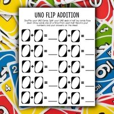 a pile of uno - flip addition cards sitting on top of each other with numbers and symbols