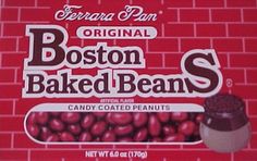 boston baked beans in candy coated peanuts on a red brick wall with the words boston baked beans