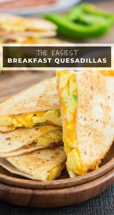 an egg and cheese quesadilla cut in half on a plate