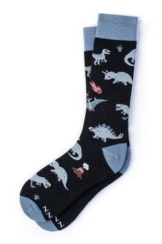 Dino-mite! These dinosaur socks will have you stepping back in time but not in style. Featuring three of the most prolific dinosaurs, these socks will add the boom factor you've been looking for. Dinosaur Socks, Goth Cottagecore, Men's Dress Socks, Sock Collection, Fairycore Grunge, Grey Socks, Sock Outfits, Mens Dress Socks, Novelty Socks