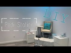 a chair sitting on top of a counter next to a dryer in a room