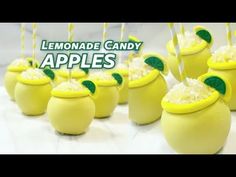 lemonade candy apples with green leaves on them