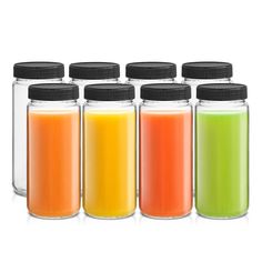 six jars filled with different colored liquids