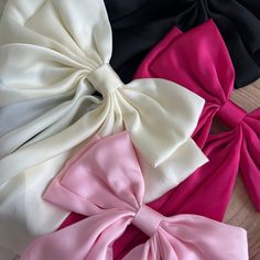 As the newest addition to our bow collection, the luxe silk bow does not disappoint. This oversized bow elevates and adds a pop to any holiday outfit. - Material: Satin - Size: 8.9(L) x 12.6(H) inches - Tight, clasping barrette closure - Designed with love in San Diego Shop the rest of our bow collection here FAQ click here Return Policy click here Chic Decorative Bow For Black Tie Events, Satin Bow For Black-tie Events, Pink Bow Tie With Detachable Bow For Party, Chic Detachable Bow Tie For Black Tie Events, White Satin Bow For Evening, Chic Evening Bow With Detachable Feature, Elegant Pink Bow For Black Tie Events, Chic Satin Bow Tie For Evening, Chic Evening Bow Tie With Satin