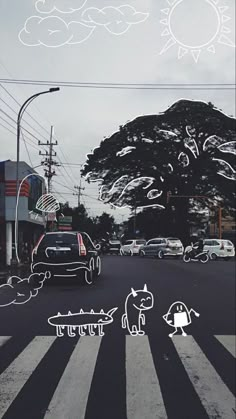 an image of cars driving down the road with sun and clouds in the sky above them