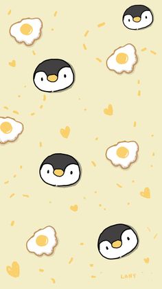 an image of eggs and penguins on a yellow background