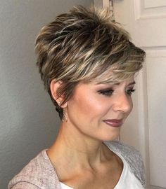 Pixie hairstyles for older women offering chic and youthful short cuts. Explore textured pixie designs, layered short styles, and mature pixie variations. Discover pixie haircut ideas featuring side-swept bangs, spiky tops, and elegant gray pixies. Find inspiration for low-maintenance pixie cuts, voluminous short styles, and age-defying pixie looks. Get styled with these flattering short hairstyles perfect for older women seeking a modern and confident appearance. Vaseline For Hair, Kort Bob, Girls Short Haircuts, Short Hair Trends, Short Choppy Hair, Cut Her Hair, Best Short Haircuts, Girl Haircuts