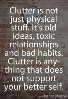 a brick wall with the words clutter is not just physical stuff