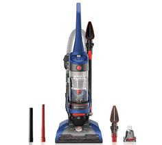 a blue and black vacuum is next to some cleaning supplies on a white surface,