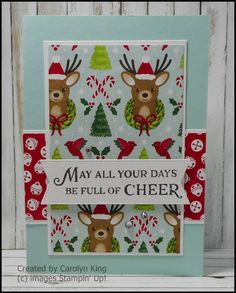 a christmas card with reindeers and candy canes on the bottom, says may all your days be full of cheer