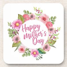 a happy mother's day card with pink flowers and greenery around the circle