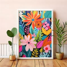 an art print on a wall next to potted plants